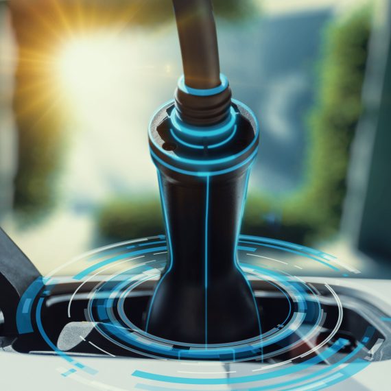 ev-charger-plug-into-electric-car-display-digital-hologram-electric-recharging-sky-closeup-shot-tree-building-cutting-edge-innovation-future-ev-car-energy-sustainability-peruse