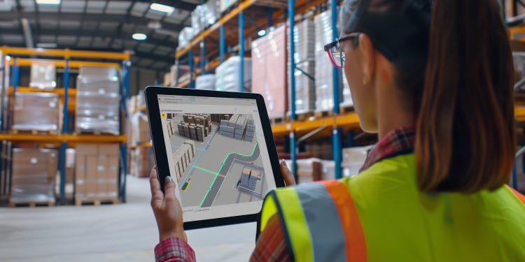 woman-checking-tablet-warehouse