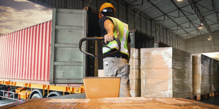 workers-unloading-package-boxes-pallets-warehouse-shipment-goods-distribution-warehouse