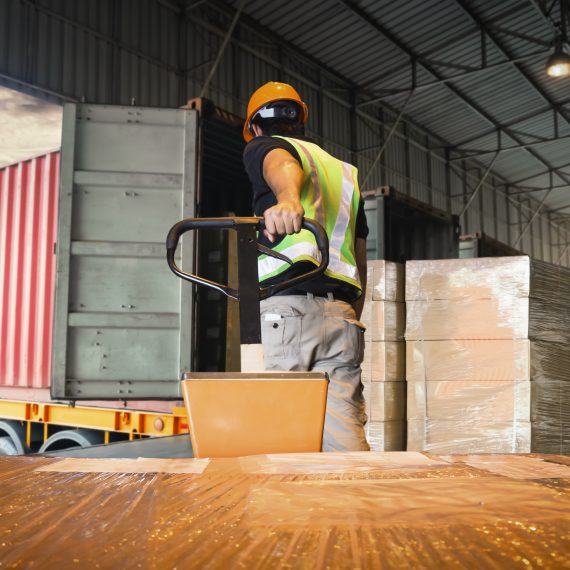 workers-unloading-package-boxes-pallets-warehouse-shipment-goods-distribution-warehouse